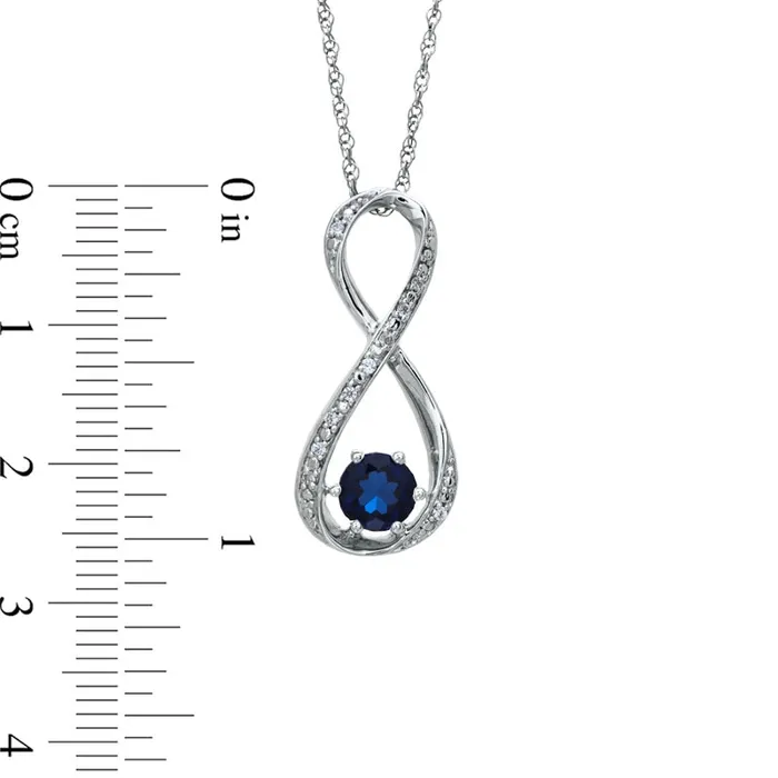 55mm LabCreated Blue Sapphire and Diamond Accent Infinity Pendant in Sterling Silver Goldia Necklaces 55mm LabCreated Blue Sapphire and Diamond Accent Infinity Pendant in Sterling Silver Goldia Necklaces