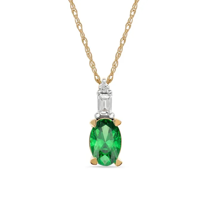 Goldia Necklaces Oval Emerald and 005 CT TW Baguette and Round Natural Diamond Stacked Top Accent Pendant in 10K Yellow Gold Goldia Necklaces Oval Emerald and 005 CT TW Baguette and Round Natural Diamond Stacked Top Accent Pendant in 10K Yellow Gold
