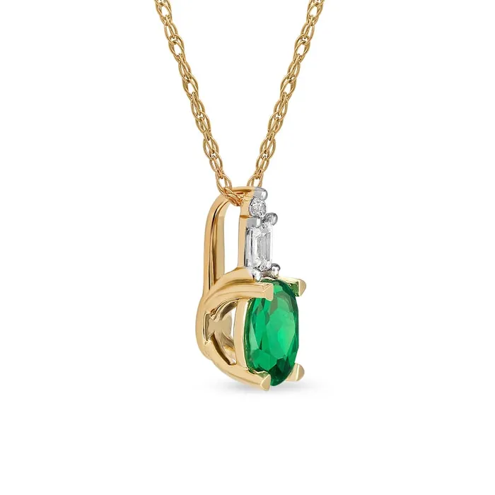 Goldia Necklaces Oval Emerald and 005 CT TW Baguette and Round Natural Diamond Stacked Top Accent Pendant in 10K Yellow Gold Goldia Necklaces Oval Emerald and 005 CT TW Baguette and Round Natural Diamond Stacked Top Accent Pendant in 10K Yellow Gold