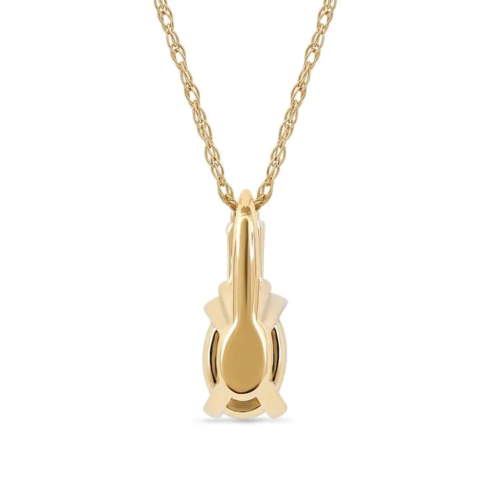 Goldia Necklaces Oval Emerald and 005 CT TW Baguette and Round Natural Diamond Stacked Top Accent Pendant in 10K Yellow Gold Goldia Necklaces Oval Emerald and 005 CT TW Baguette and Round Natural Diamond Stacked Top Accent Pendant in 10K Yellow Gold