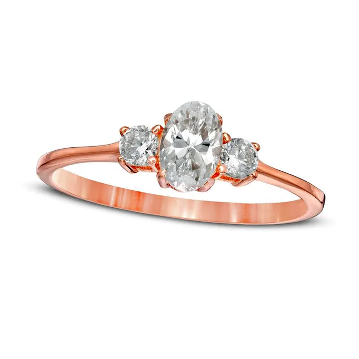 Goldia Rings 063 CT TW Oval and Round Natural Diamond Three Stone Engagement Ring in Solid 14K Rose Gold Goldia Rings 063 CT TW Oval and Round Natural Diamond Three Stone Engagement Ring in Solid 14K Rose Gold