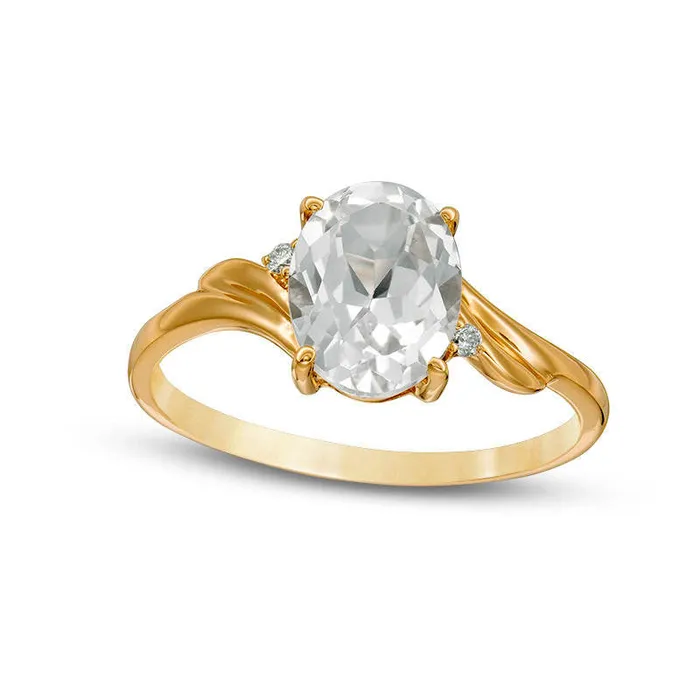 Goldia Rings Oval LabCreated White Sapphire and Diamond Accent Bypass Swirl Shank Ring in Solid 10K Yellow Gold Goldia Rings Oval LabCreated White Sapphire and Diamond Accent Bypass Swirl Shank Ring in Solid 10K Yellow Gold
